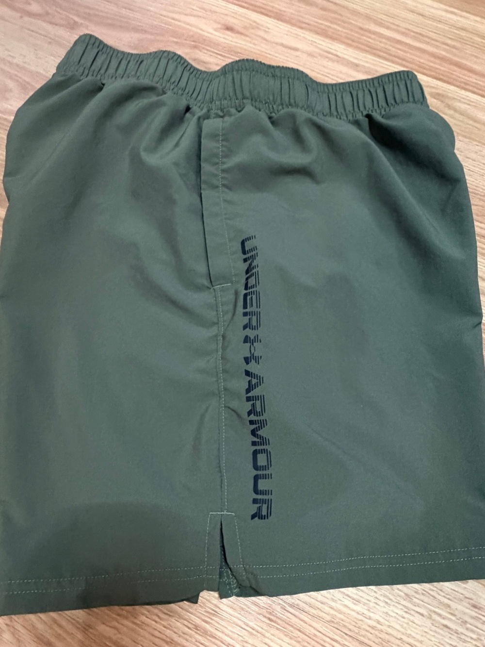 Under Armour Men's Olive Green Athletic Shorts with Vertical Logo